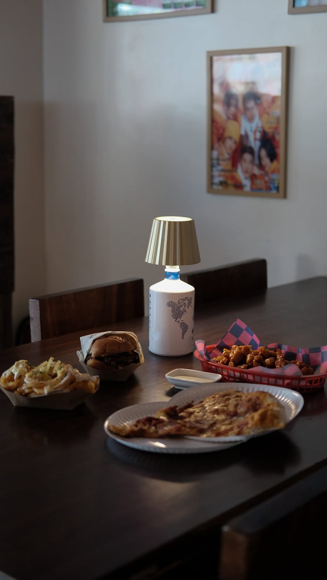 Interior table spread with burgers and sides